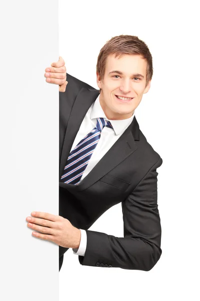 Businessman behind blank panel — Stock Photo, Image