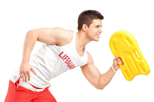 Young lifeguard running — Stock Photo, Image