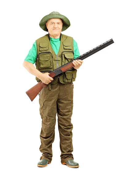 Male hunter holding rifle — Stock Photo, Image