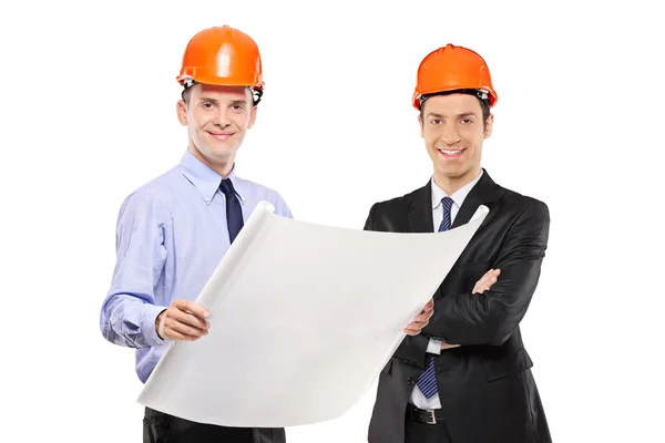 Foremen posing with blueprints — Stock Photo, Image