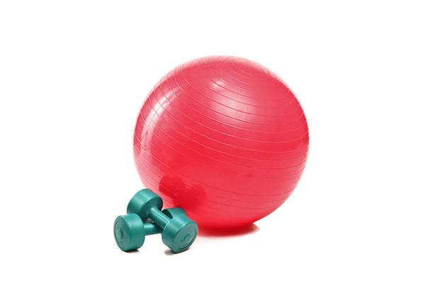 Pilates ball and dumbbells — Stock Photo, Image