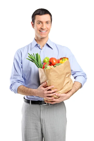 Adam holding Torbalı meyve ve vegetabl ile — Stok fotoğraf