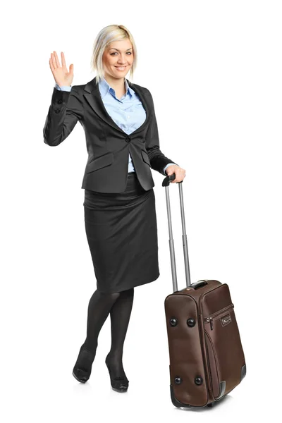 Blond kvinna bära bagage — Stockfoto