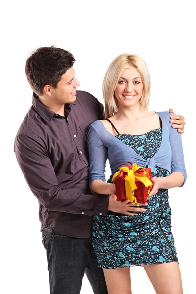 Romantic couple holding gift — Stock Photo, Image