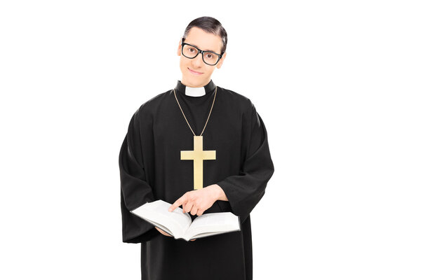 Priest pointing to paragraph of bible