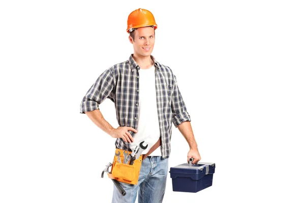 Worker holding a wrench and a toolbo — Stock Photo, Image