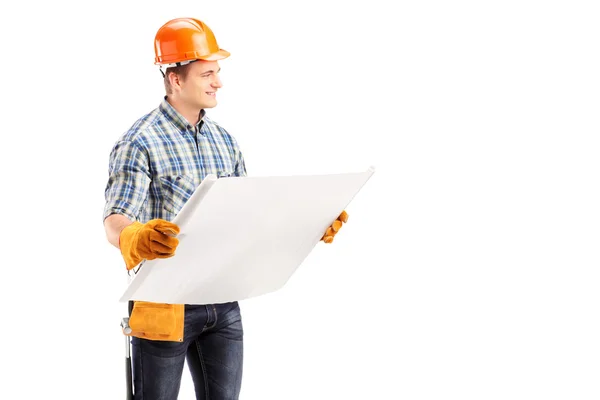 Male engineer holding blueprint — Stock Photo, Image