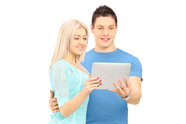Friends looking at a tablet — Stock Photo, Image