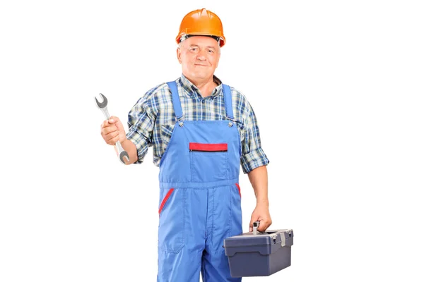 Manual worker holding wrench — Stock Photo, Image