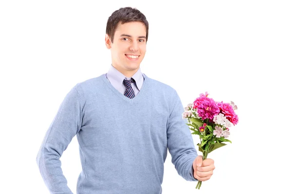 Man holding bouquet of flowers — Zdjęcie stockowe