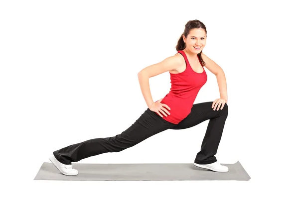 Athlete practicing pilates — Stock Photo, Image