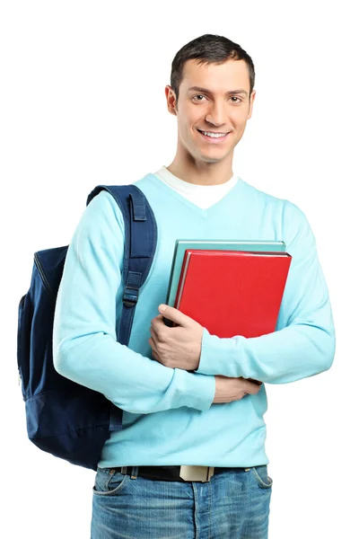 Male student holding books — Stock Photo, Image