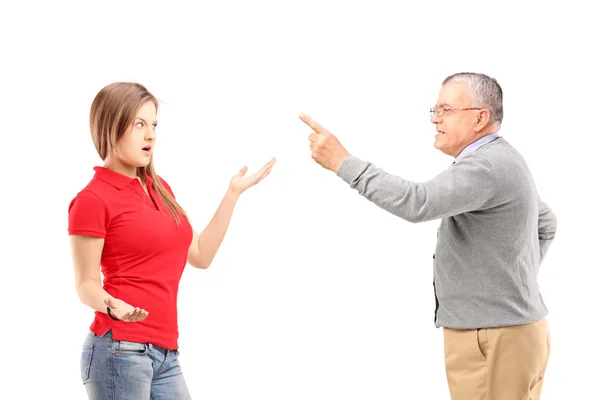 Father reprimanding teenage daughter — Stock Photo, Image