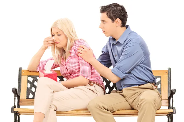 Young man comforting his sad girlfriend — Stock Photo, Image