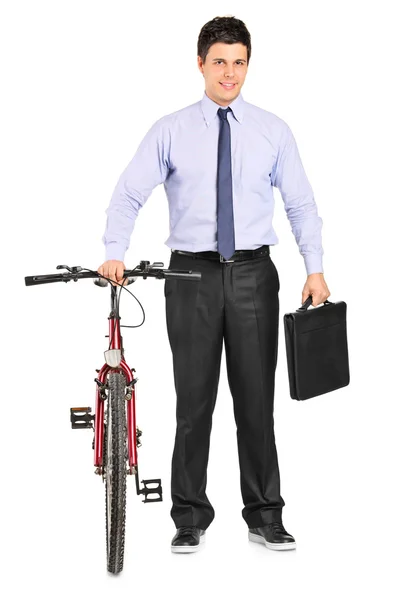 Businessman posing next to bicycle — Stock Photo, Image