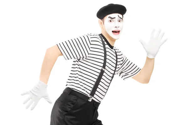 Scared mime artist running away — Stock Photo, Image