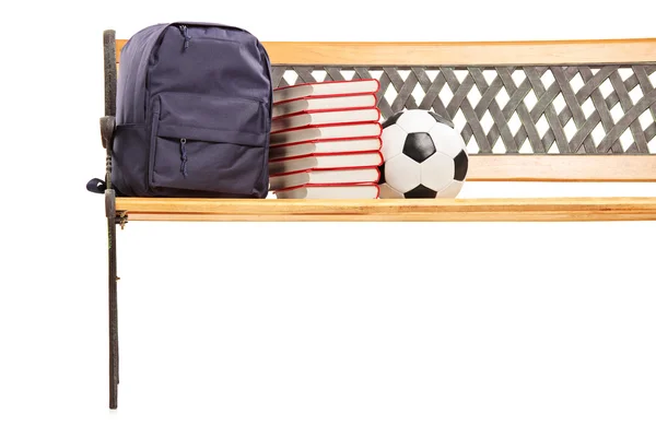 Books, school bag and soccer ball — Stock Photo, Image