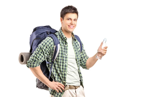 Hiker holding bottle of water — Stock Photo, Image