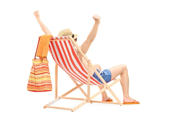 Guy enjoying on beach chair — Stock Photo, Image