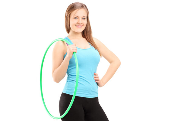 Female athlete holding a hula-hoop
