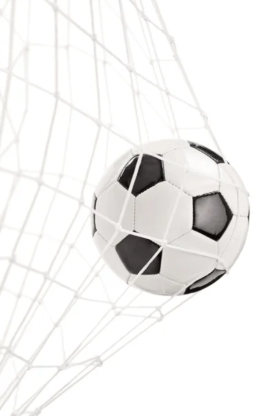 Bola de futebol em uma rede — Fotografia de Stock