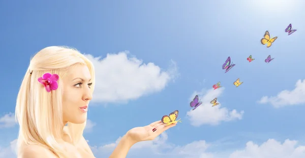 Female with butterflies — Stock Photo, Image