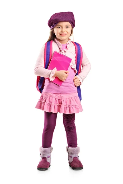 Niña de la escuela sosteniendo portátil — Foto de Stock