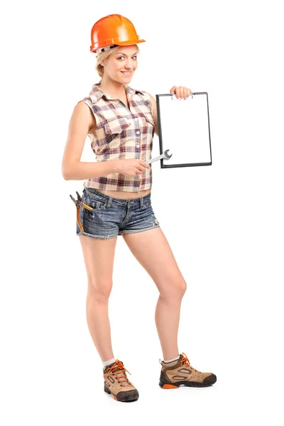 Portrait of a manual worker holding a clipboard — Stock Photo, Image