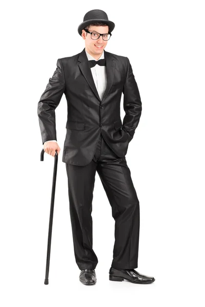 Homem elegante com cana posando — Fotografia de Stock