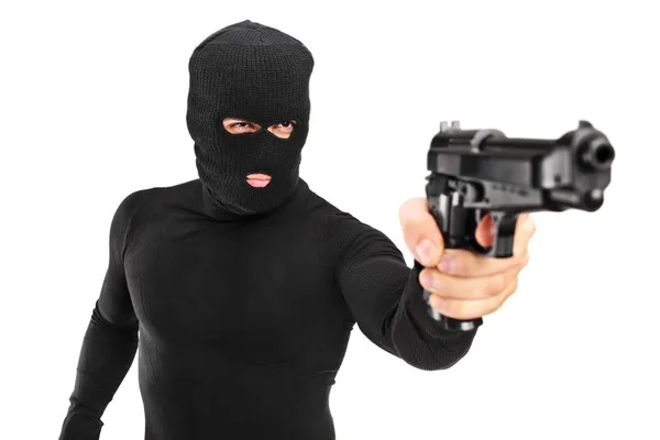 Man with robbery mask holding gun — Stock Photo, Image