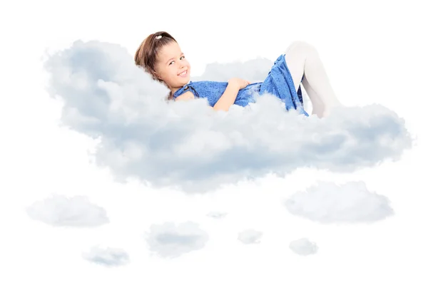 Girl laying on cloud — Stock Photo, Image