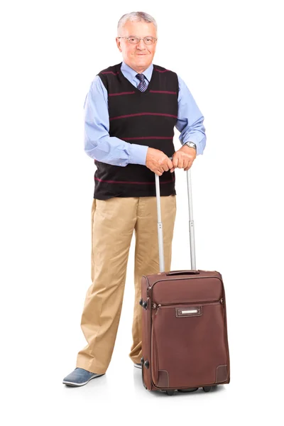 Senior gentleman with travel bag — Stock Photo, Image