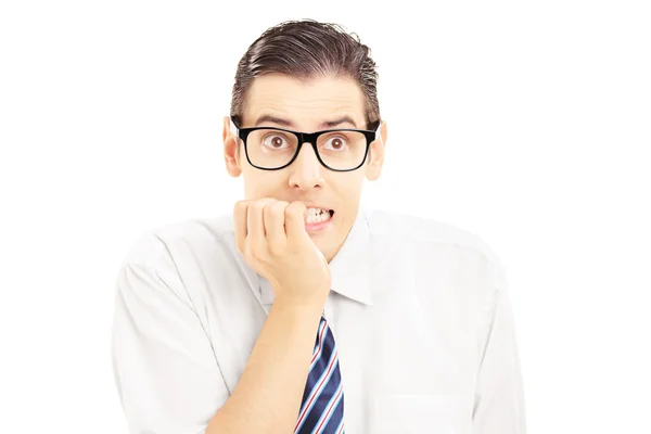 Frightened young man looking at camera — Stock Photo, Image