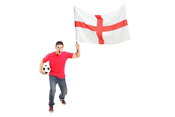 Wentylator euforii, trzymając piłkę i flaga — Zdjęcie stockowe