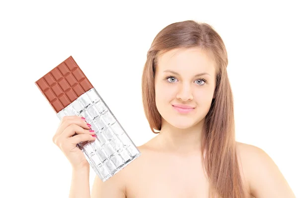 Vrouwelijke bedrijf grote chocolade — Stockfoto