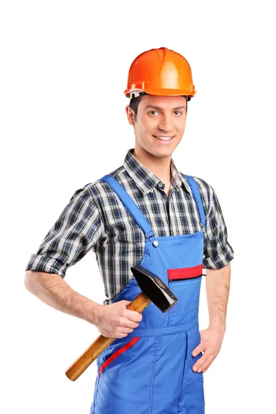 Arbeider houdt een hamer — Stockfoto