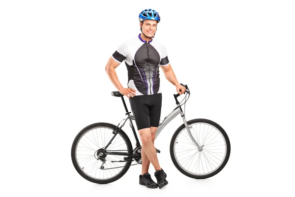 Bicyclist next to bicycle — Stock Photo, Image