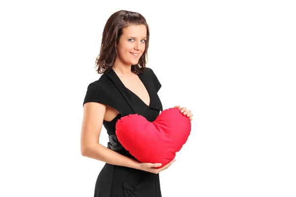 Woman holding a red heart — Stock Photo, Image