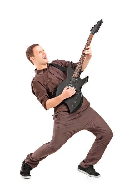 Mann spielt auf E-Gitarre — Stockfoto