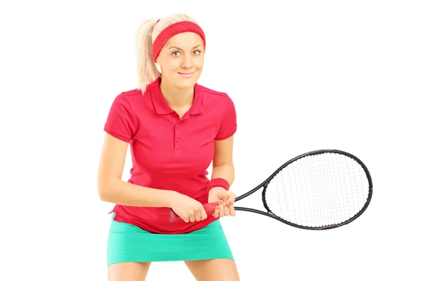 Jugadora de tenis sosteniendo una raqueta — Foto de Stock