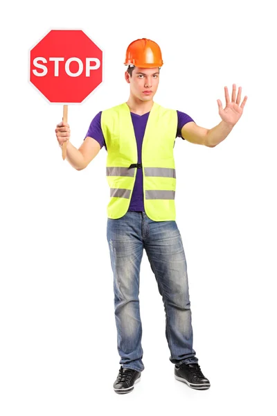 Ouvrier de la construction attente signe stop — Photo