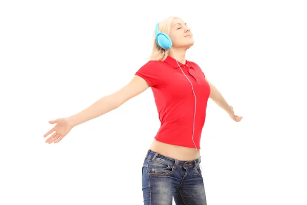 Woman with headphones listening music — Stock Photo, Image