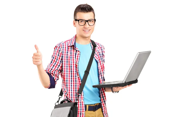 Male student giving thumb up — Stock Photo, Image