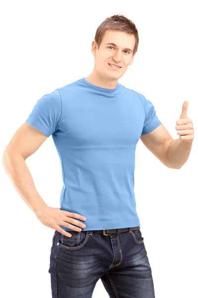 Young handsome man giving a thumb up — Stock Photo, Image