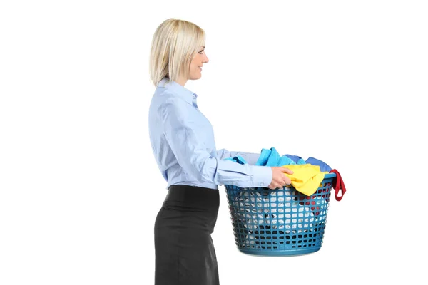 Woman carrying laundry basket — Stock Photo, Image