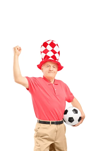 Starsze sport fan gospodarstwa piłka — Stockfoto