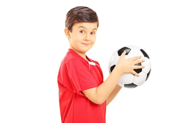 Young boy holding a soccer ball — Stock Photo, Image