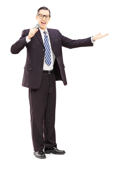 Male announcer holding microphone — Stock Photo, Image