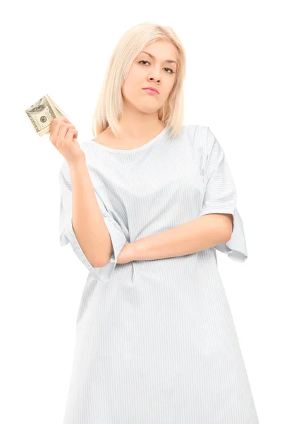 Paciente feminina segurando dinheiro — Fotografia de Stock
