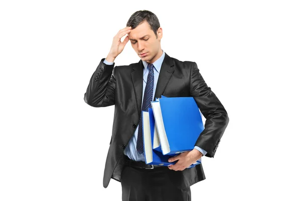 Businessperson holding head in pain — Stock Photo, Image